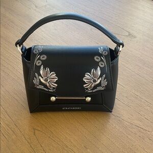 Strathberry Black Mini Bag with Silver Floral Detail
